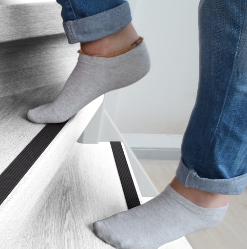 White staircase with black stair strip